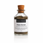 Load image into Gallery viewer, Glass jar of Mysuru Naturals Face Scrub with cork lid on a white background
