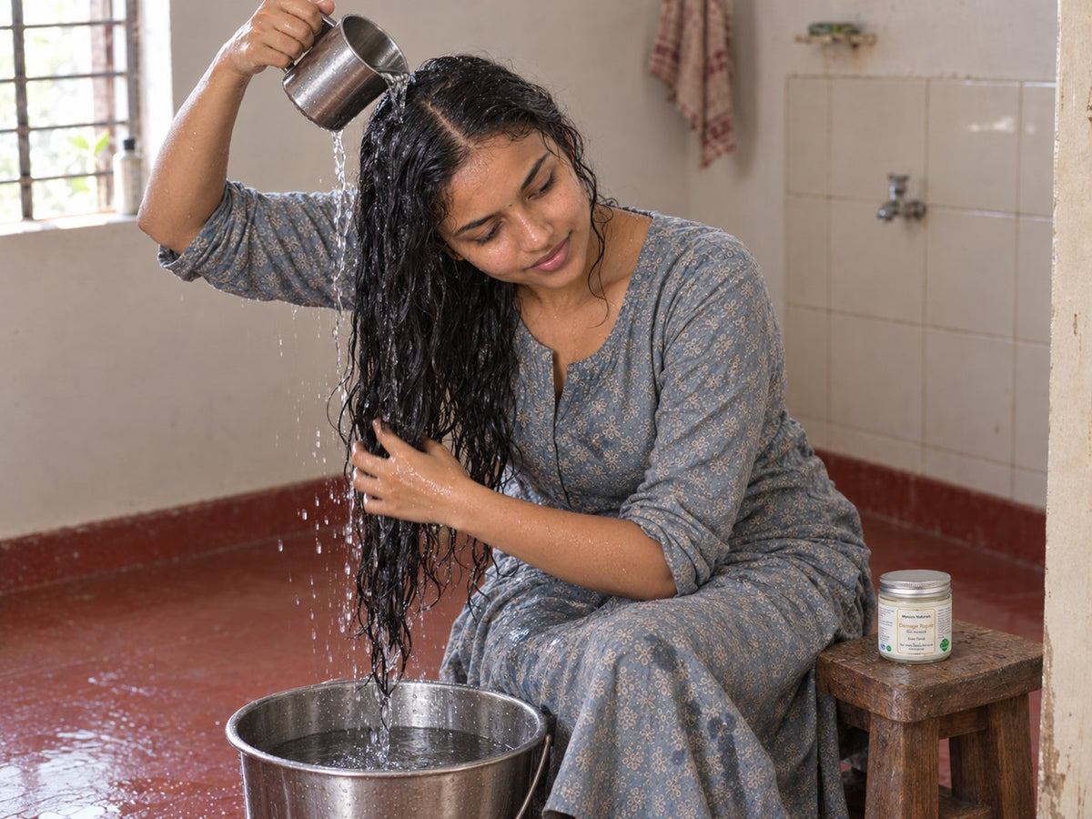 Young woman washing out the prewash cream with a mild shampoo