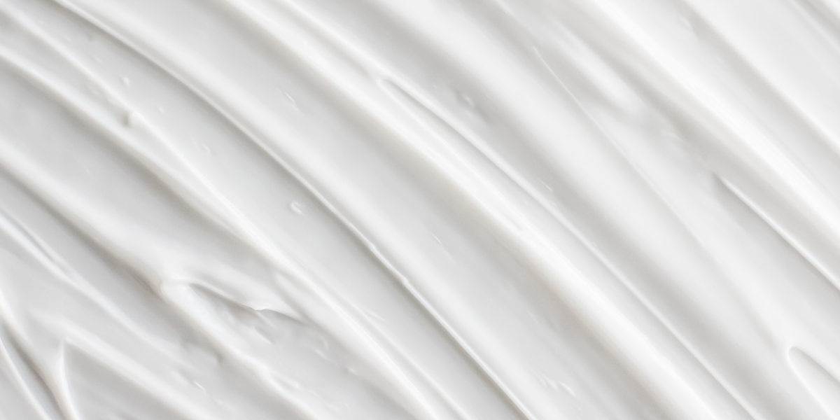 Close up of white satin fabric with soft folds
